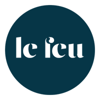 Logo of 'le feu' with a blue circle and white text on a white background