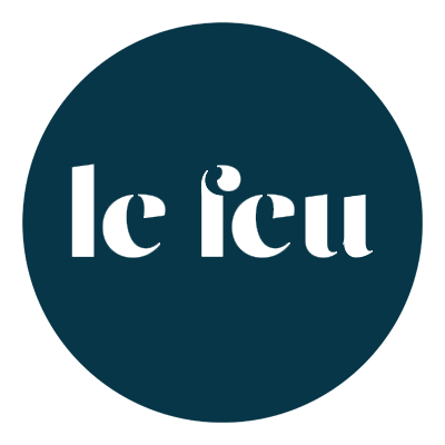 Logo of 'le feu' with a blue circle and white text on a white background
