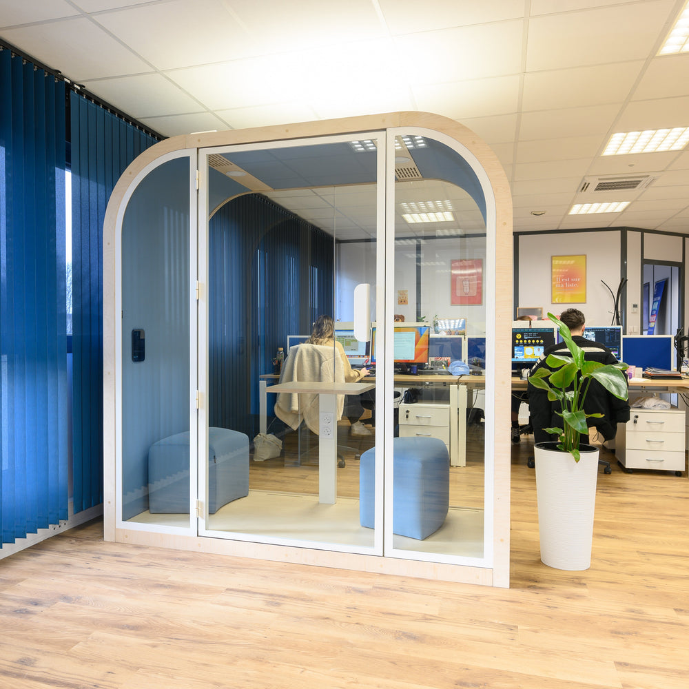 Modern office interior with a sleek modern office pod.