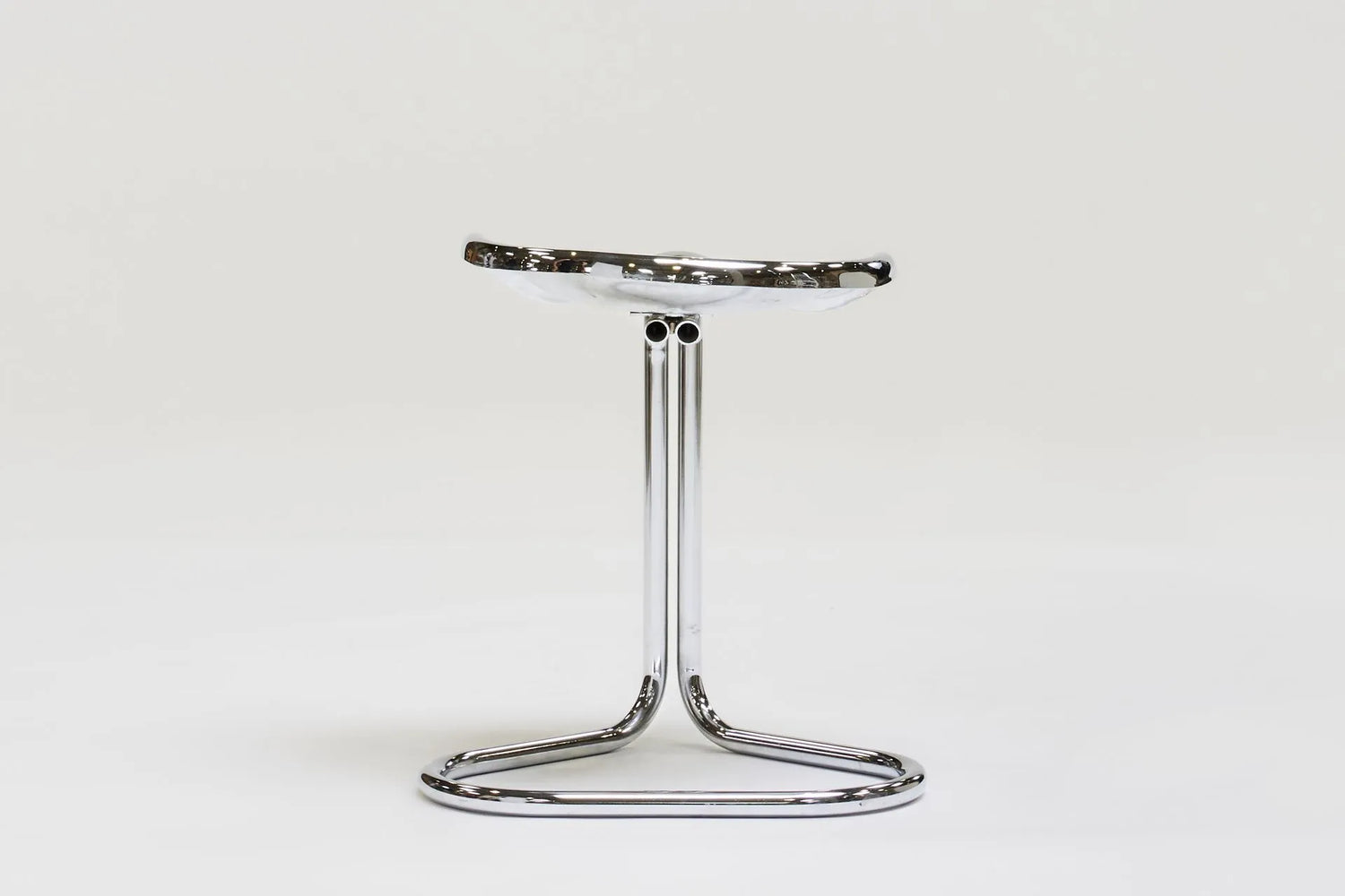 Metal stool by Rodney Kinsman