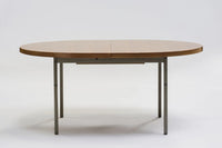 Mahogany dining table by Georges Frydman