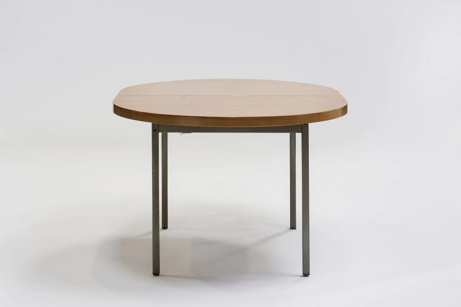 Mahogany dining table by Georges Frydman