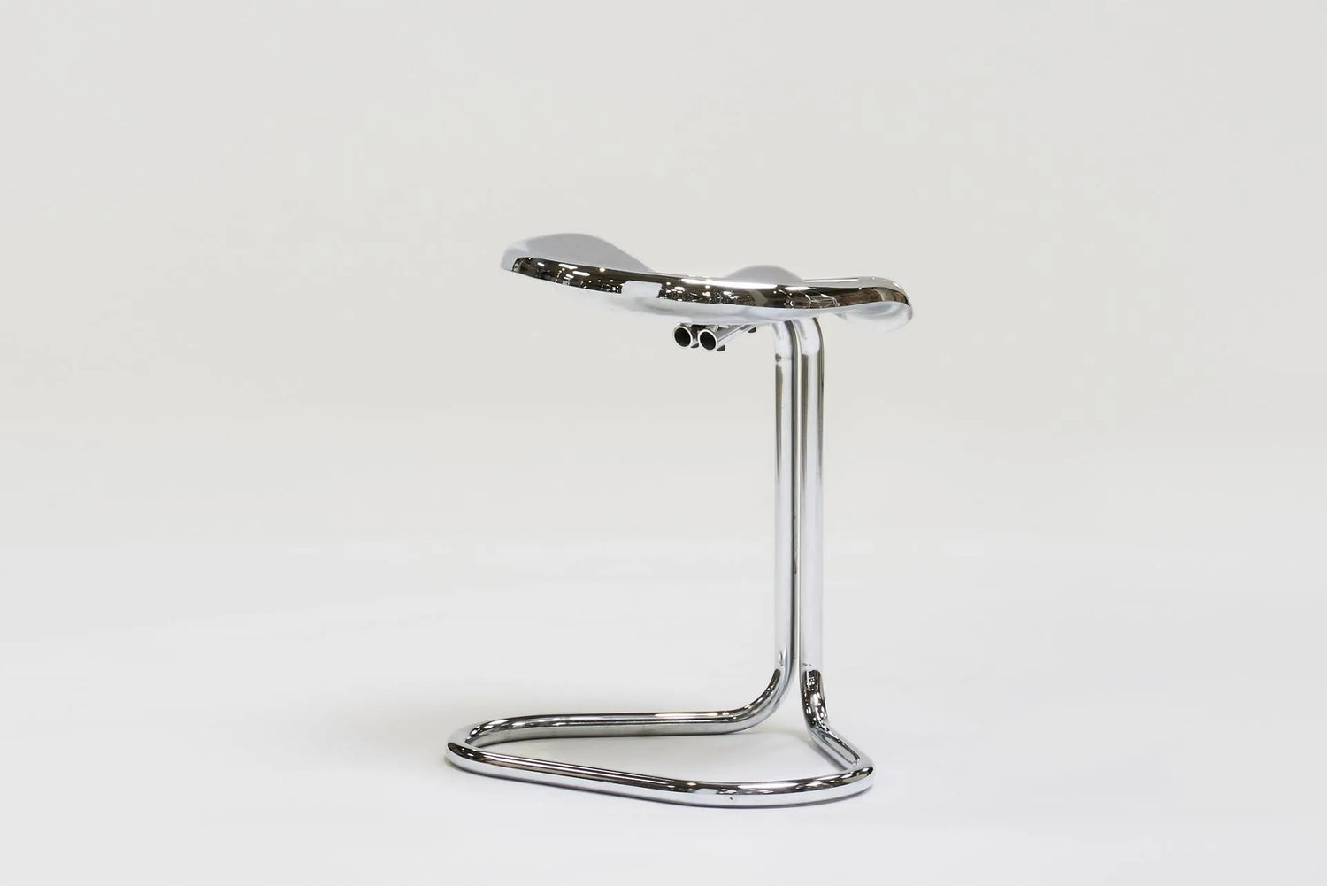 Metal stool by Rodney Kinsman