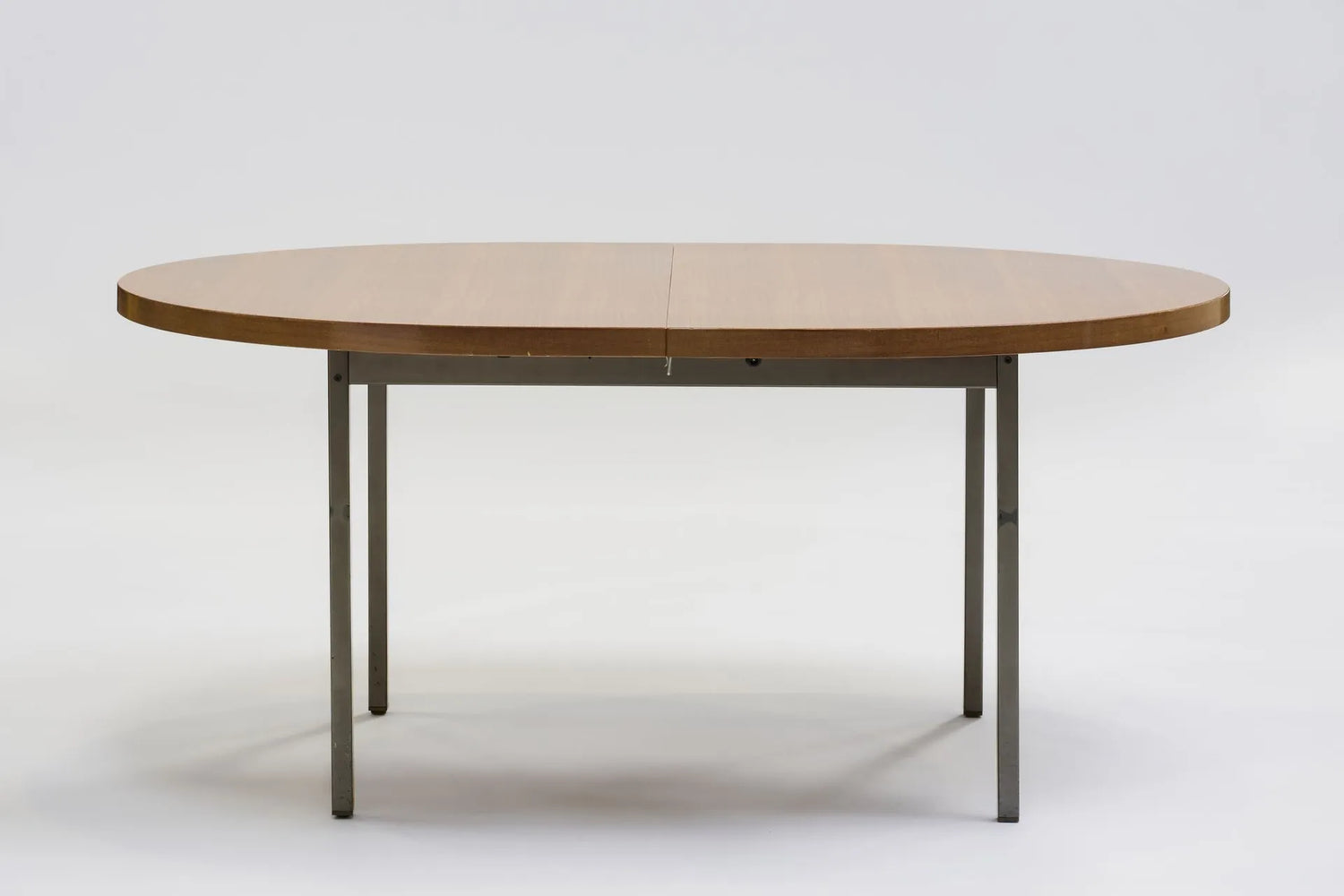 Mahogany dining table by Georges Frydman
