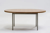 Mahogany dining table by Georges Frydman